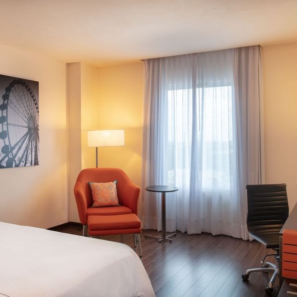 Superior Room with working desk & couch at Fiesta Inn