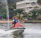 A Couple Jet skiing near Lake Kivu Serena Hotel