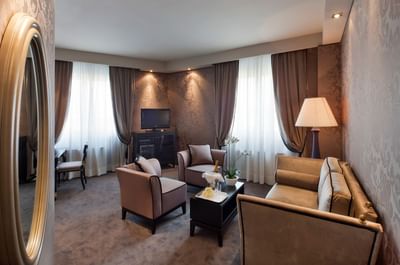 Interior of the living room area in Suite at Hotel Mozart Milan