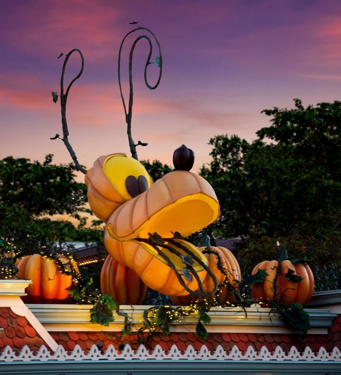 Statue of Pluto in Disneyland Resort near Anaheim Portofino Inn, a hotel near Angel Stadium and Disneyland for family trips