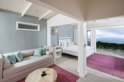 Bed & furniture in Premium room at Retreat Costa Rica