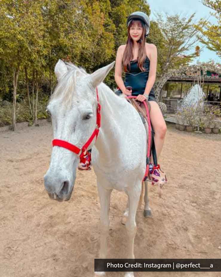 A lady was riding a horse at Countryside Stables Penang - Lexis Suites Penang