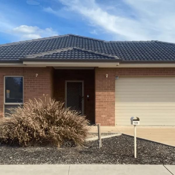 Brick house with garage and driveway at La Trobe University Regional Housing – Mildura.