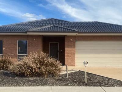 Brick house with garage and driveway at La Trobe University Regional Housing – Mildura.