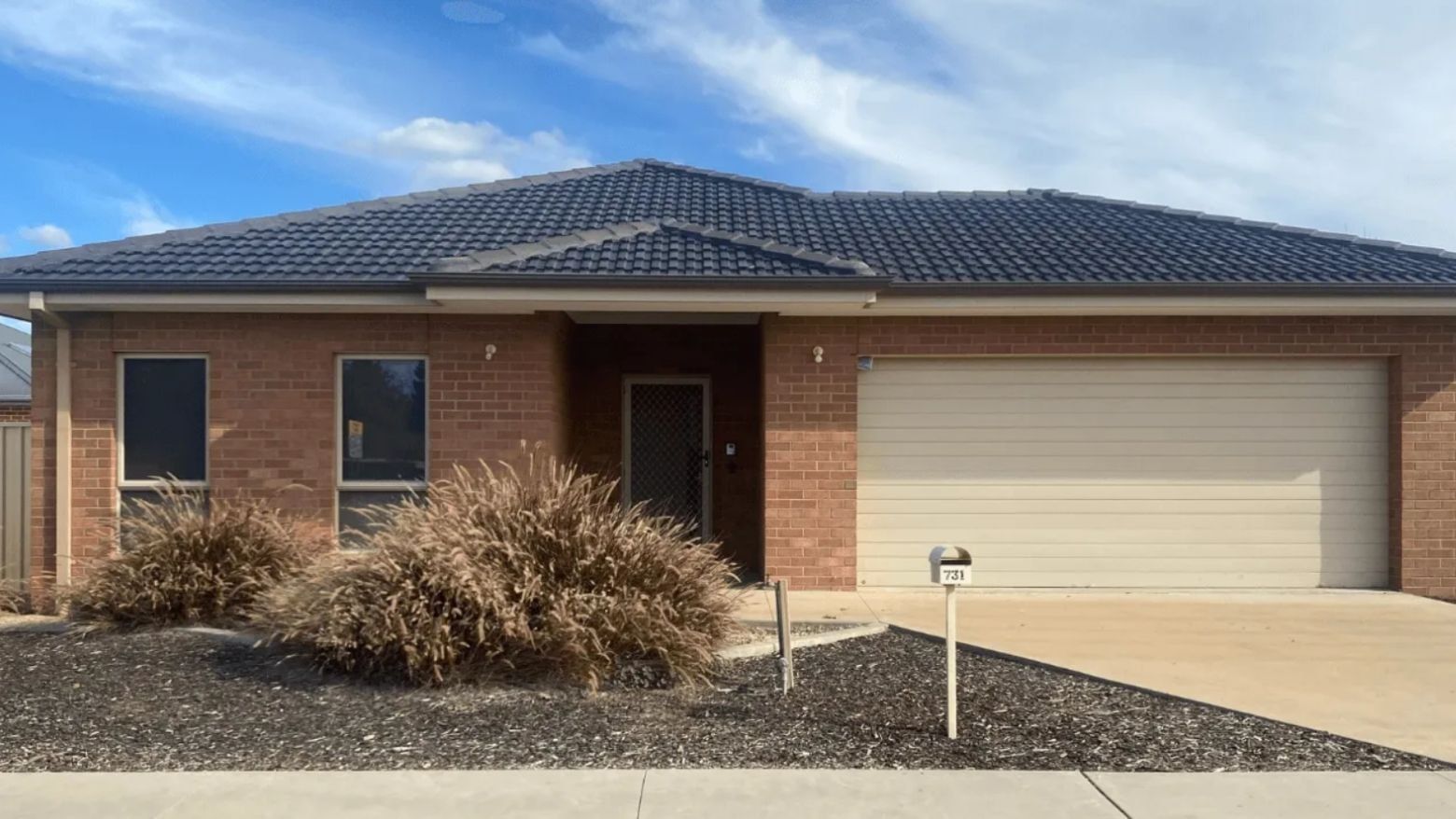 Brick house with garage and driveway at La Trobe University Regional Housing – Mildura.