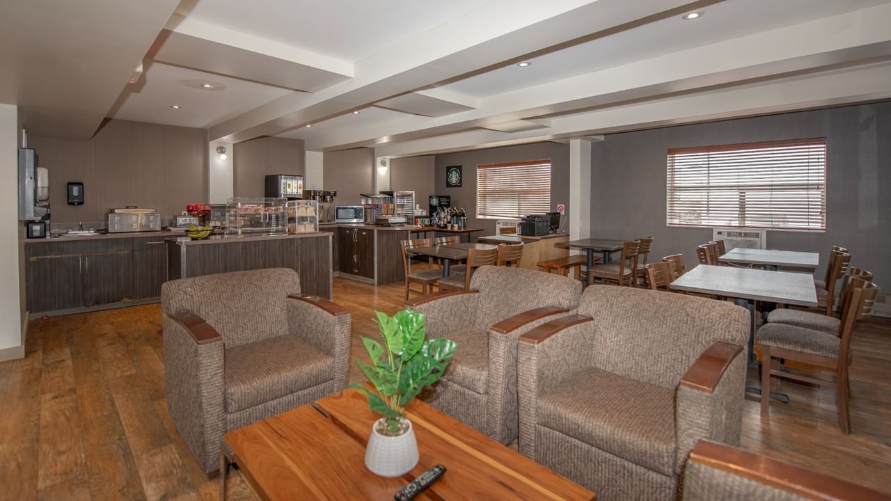 Hotel breakfast room with coffee and snacks