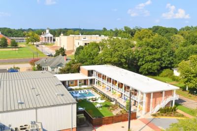 brick building next to a pool
