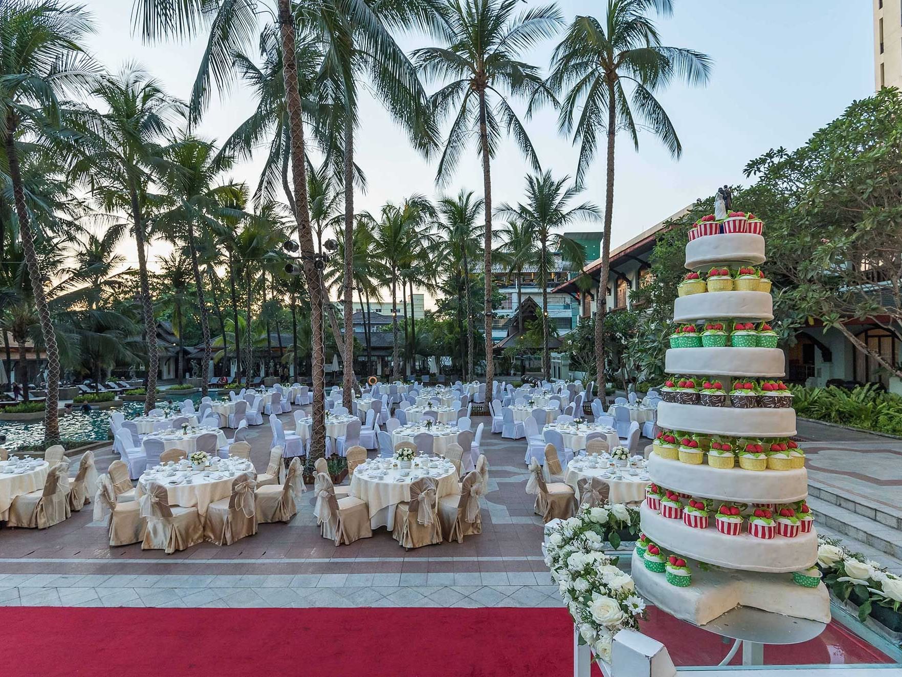 Cupcake tower by banquet tables in Pool Garden, Chatrium Hotels