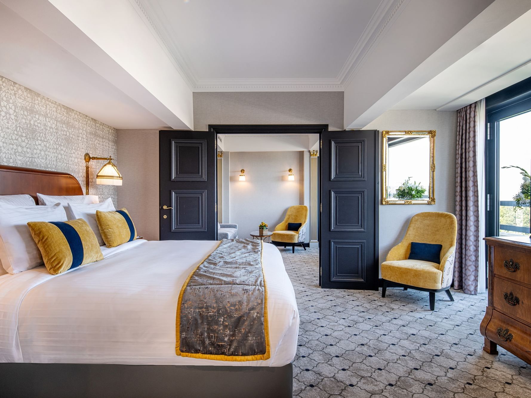 Loungers & side cupboard by the bed in Barsey Suite at Hotel Barsey by Warwick - Brussels