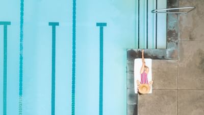 Aerial of Health Spa Napa Valley lap pool with sunbather