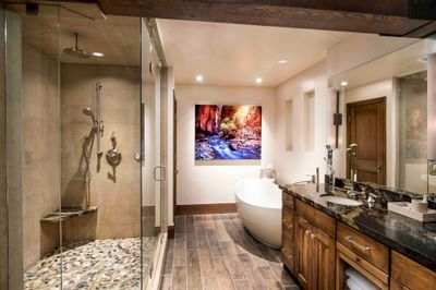 A sink, bathtub, & shower in a bathroom at Stein Eriksen Lodge