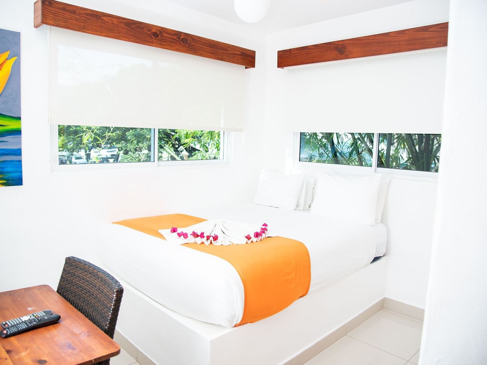Interior view of Premium Room with a queen bed at Villas Codevi