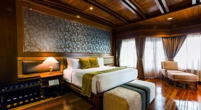 A room with one king bed at Thistle Port Dickson Resort