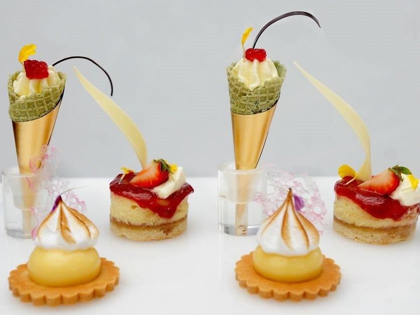 Artistic display of miniature desserts, featuring ice cream and cakes, presented at Tudors Restaurant, Marygreen Manor