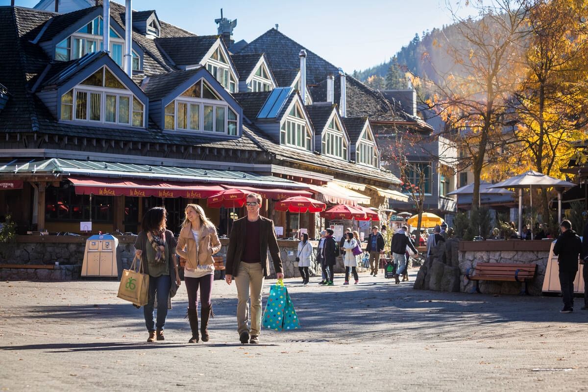 People by the market near Blackcomb Springs Suites