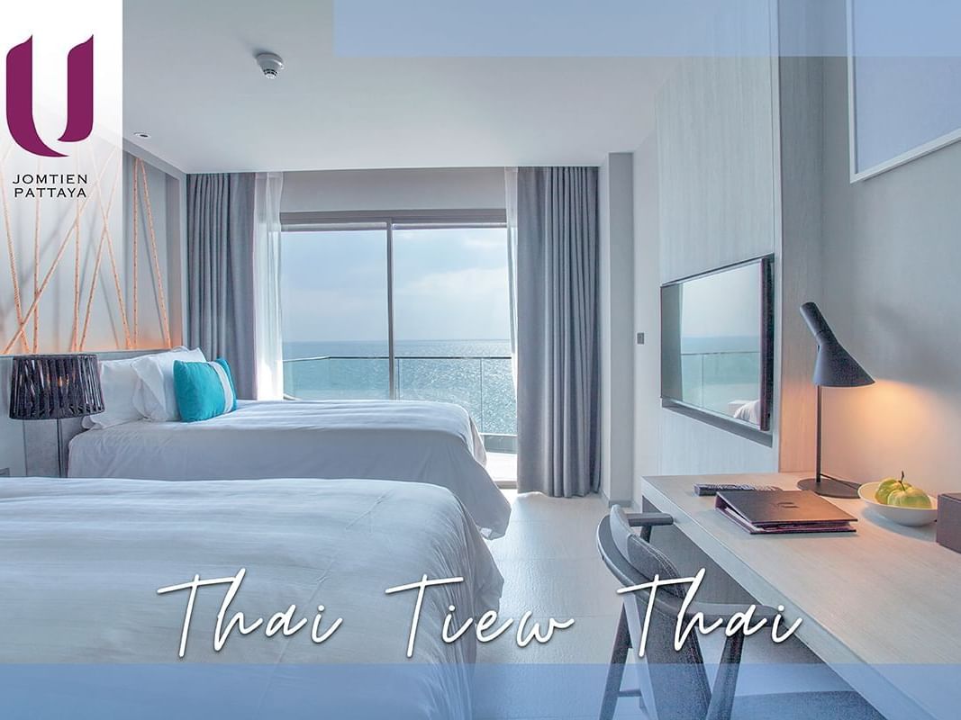 Room with Two beds and work desk at U Hotels and Resorts