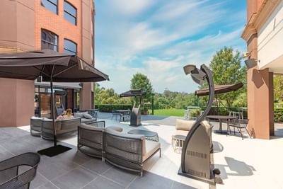 Couple in the open lounge area at Amora Hotel Melbourne