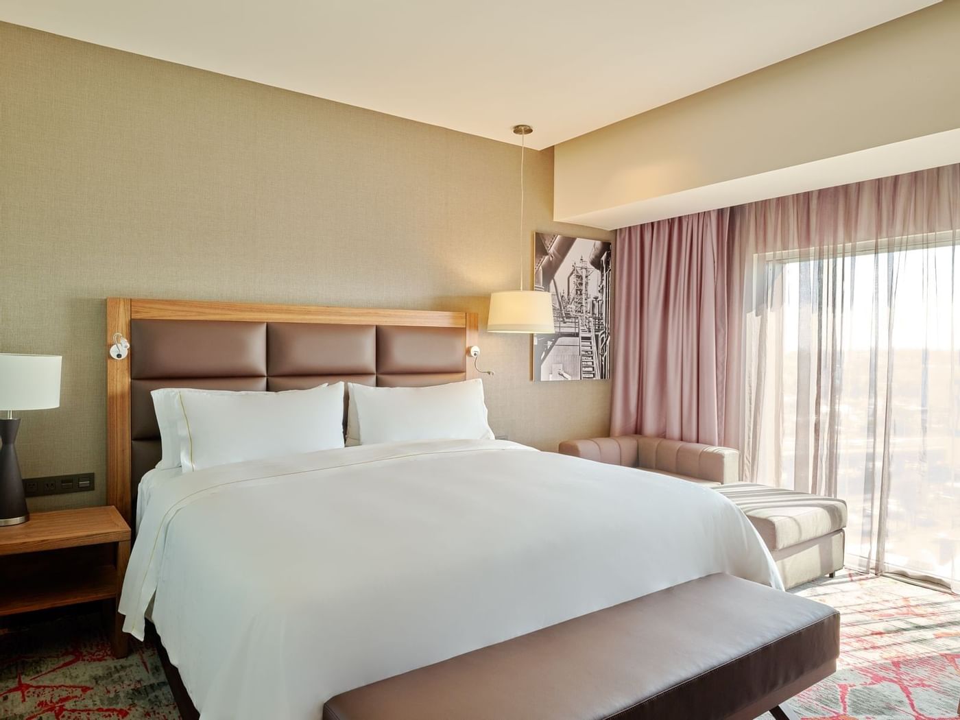 Interior of Executive 1 King bedroom at FA Hotels & Resorts