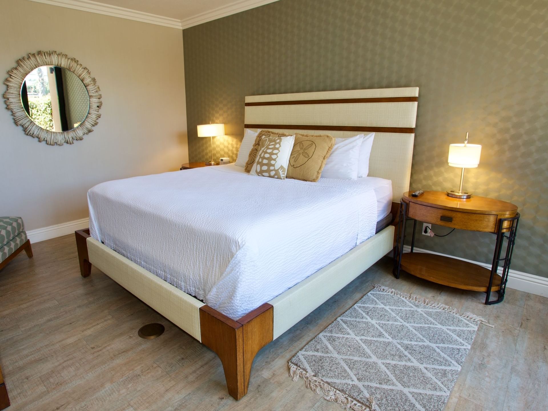 King bed in Sand Dollar Suite at Inn by the Sea at La Jolla