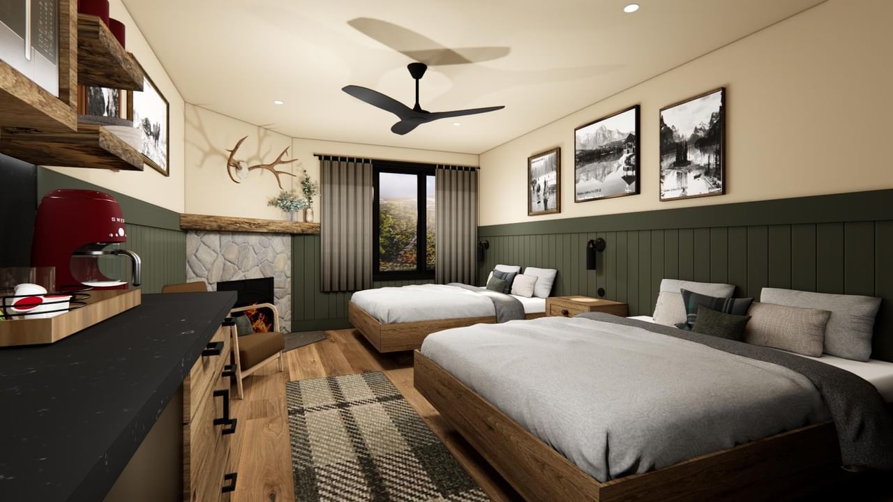 Spacious suite with two queen beds, fireplace, and views.
