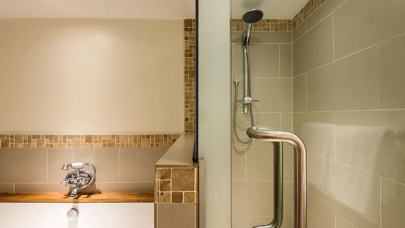 Bathroom bathtub & shower in Warwick Suite at Warwick Fiji