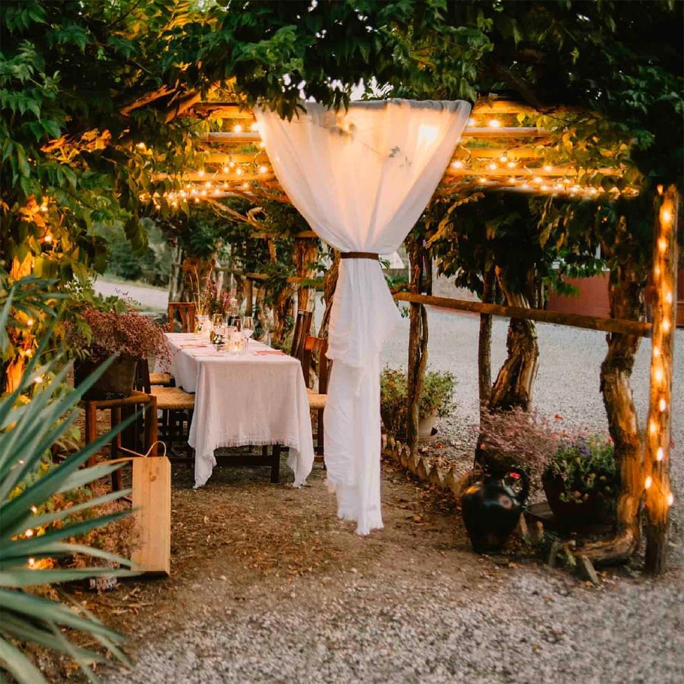 Outdoor dinner arrangement by the lagoon, Falkensteiner Hotels