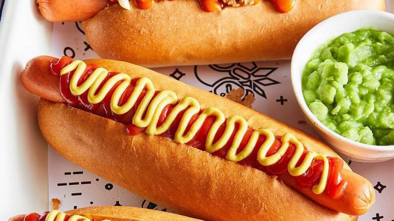 Harry's Cafe de Wheels Hotdogs with garnish