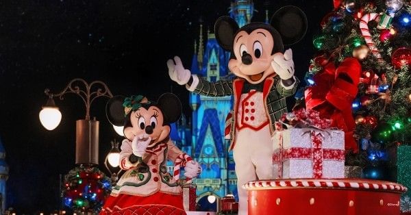 Mickey and Minnie on a Christmas float during the Mickey's Once Upon a Christmastime Parade.
