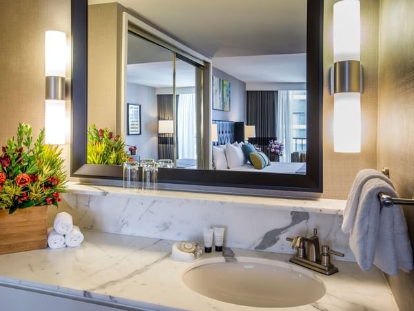 Bathroom with mirror & wash basin at Warwick Seattle