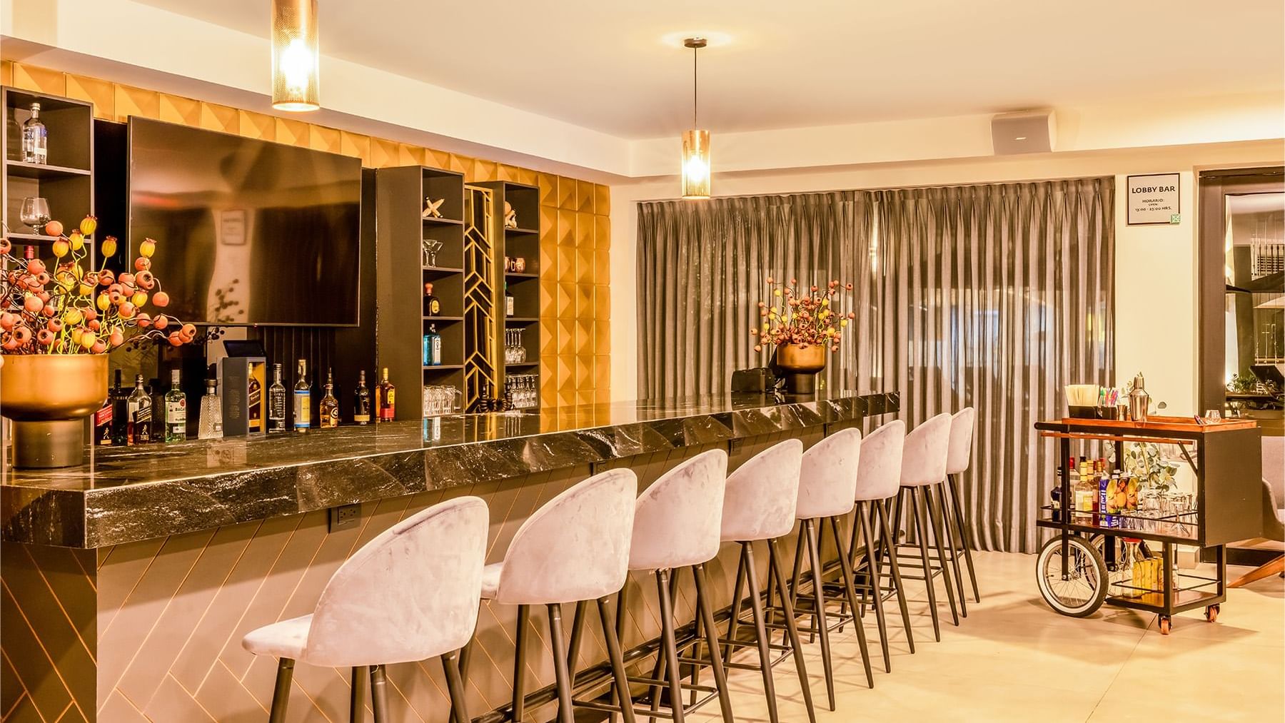 Stools by the Bar counter at Gamma Ciudad Juarez 