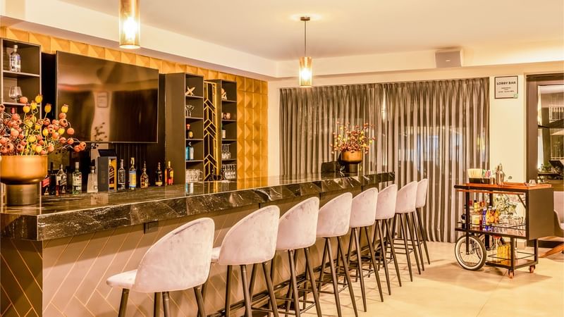 Stools by the Bar counter at Gamma Ciudad Juarez 
