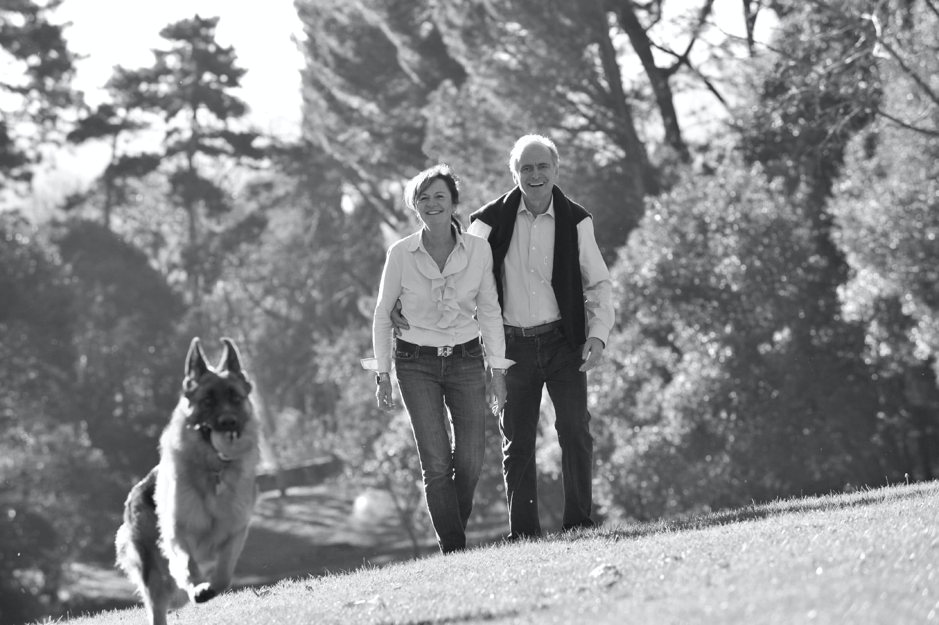 A couple and their pet dog near Domaine de Manville