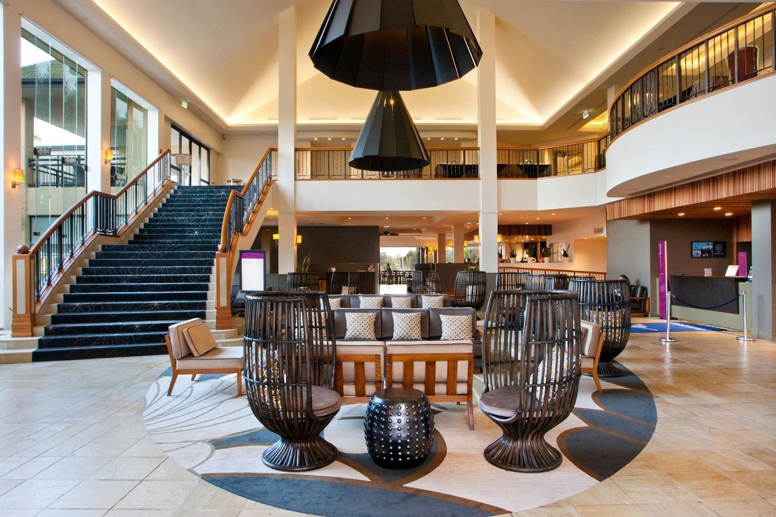 The Lobby area with staircase at Mercure Gold Coast Resort