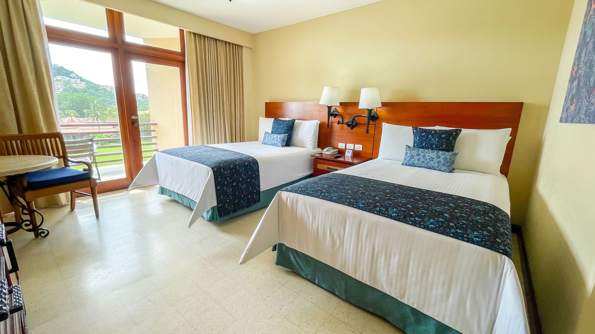 Bed & furniture in Double Superior Ocean View at Mundo Imperial
