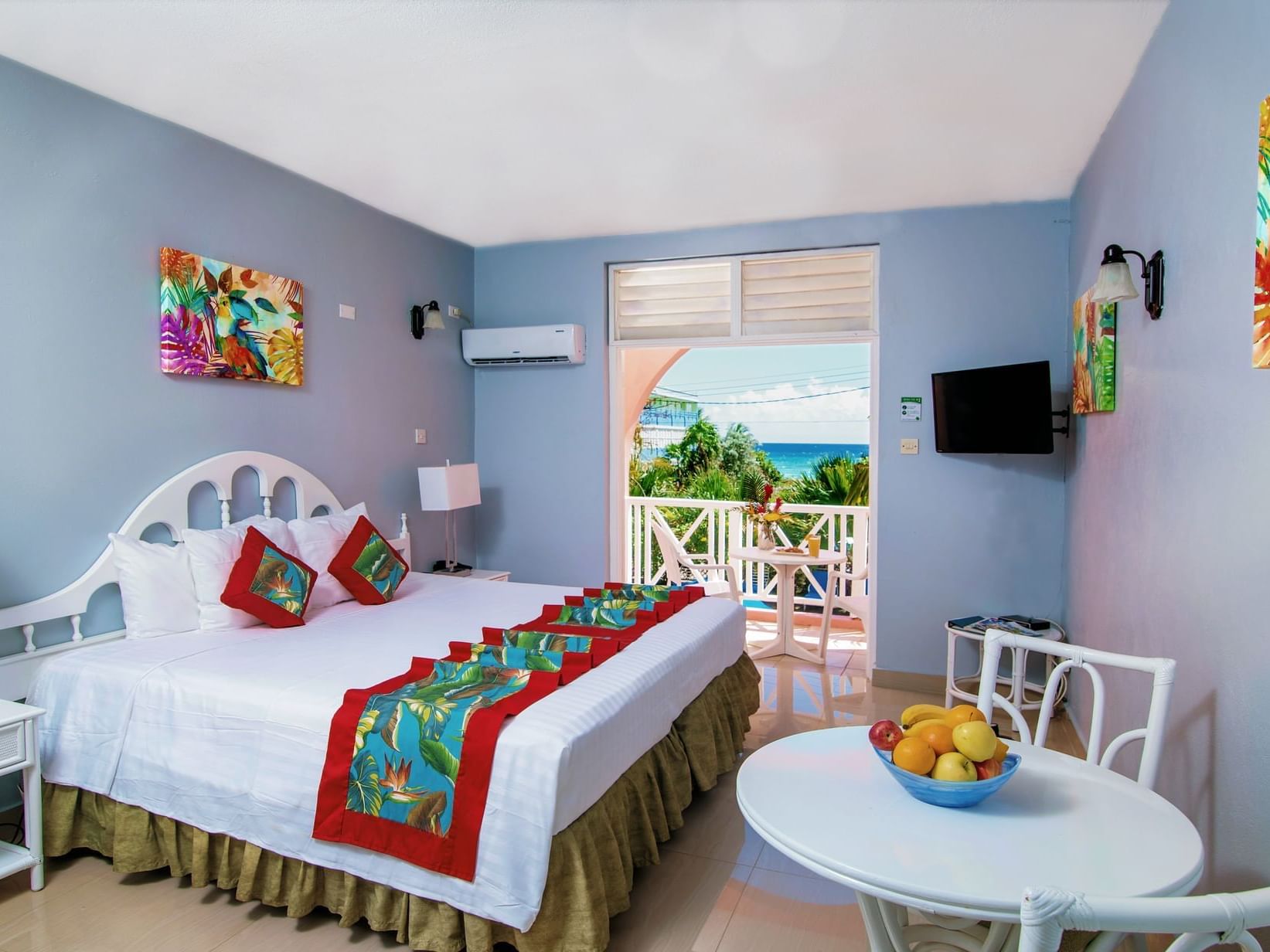 Comfy bed & dining table with a balcony in Studio Garden Pool View at Dover Beach Hotel