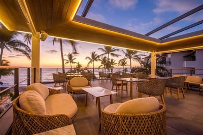 Outdoor sitting area in eveening at Buenaventura Grand