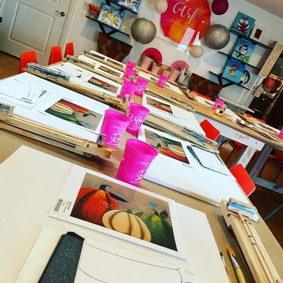 Art supplies on a table at Happy Heart near The Whittaker Inn