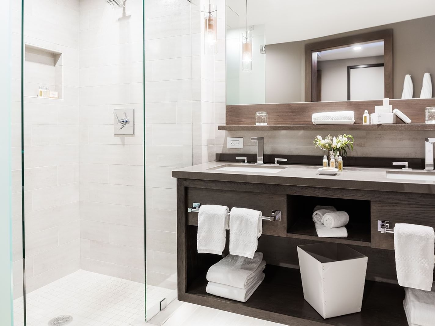 Bathroom vanity & shower in Deluxe King Room at Hotel Jackson