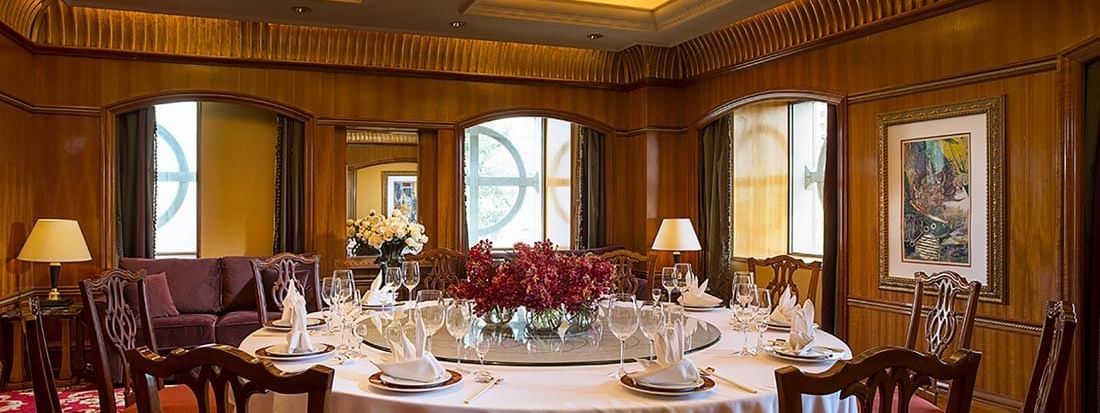 Dining table arranged in Sunshine Room Chinese Restaurant at Celebrity International Grand Hotel