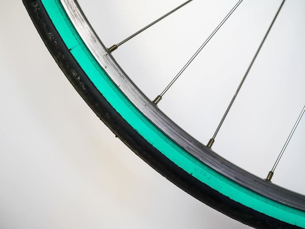 Closeup of a bicycle wheel at Oliver Like Home