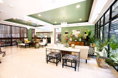 The spacious lobby lounge area of the hotel at Courtleigh Hotel & Suites
