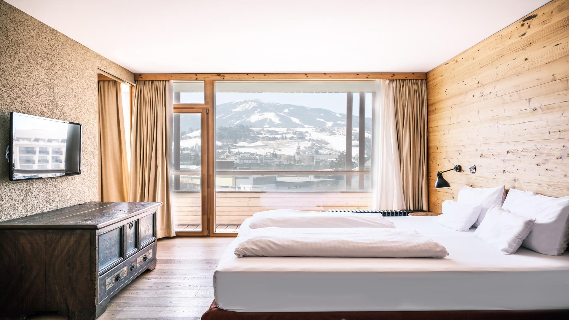 Bed with view, Senior Suite Hochgolling at Falkensteiner Hotels
