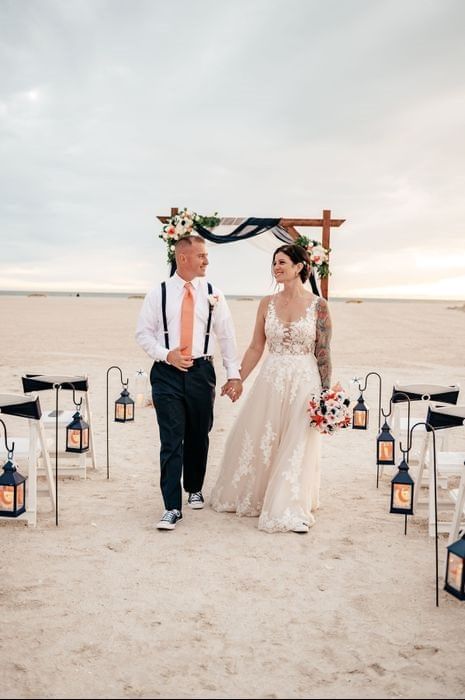 Wedding couple waling down the aisle, Thunderbird Beach Resort