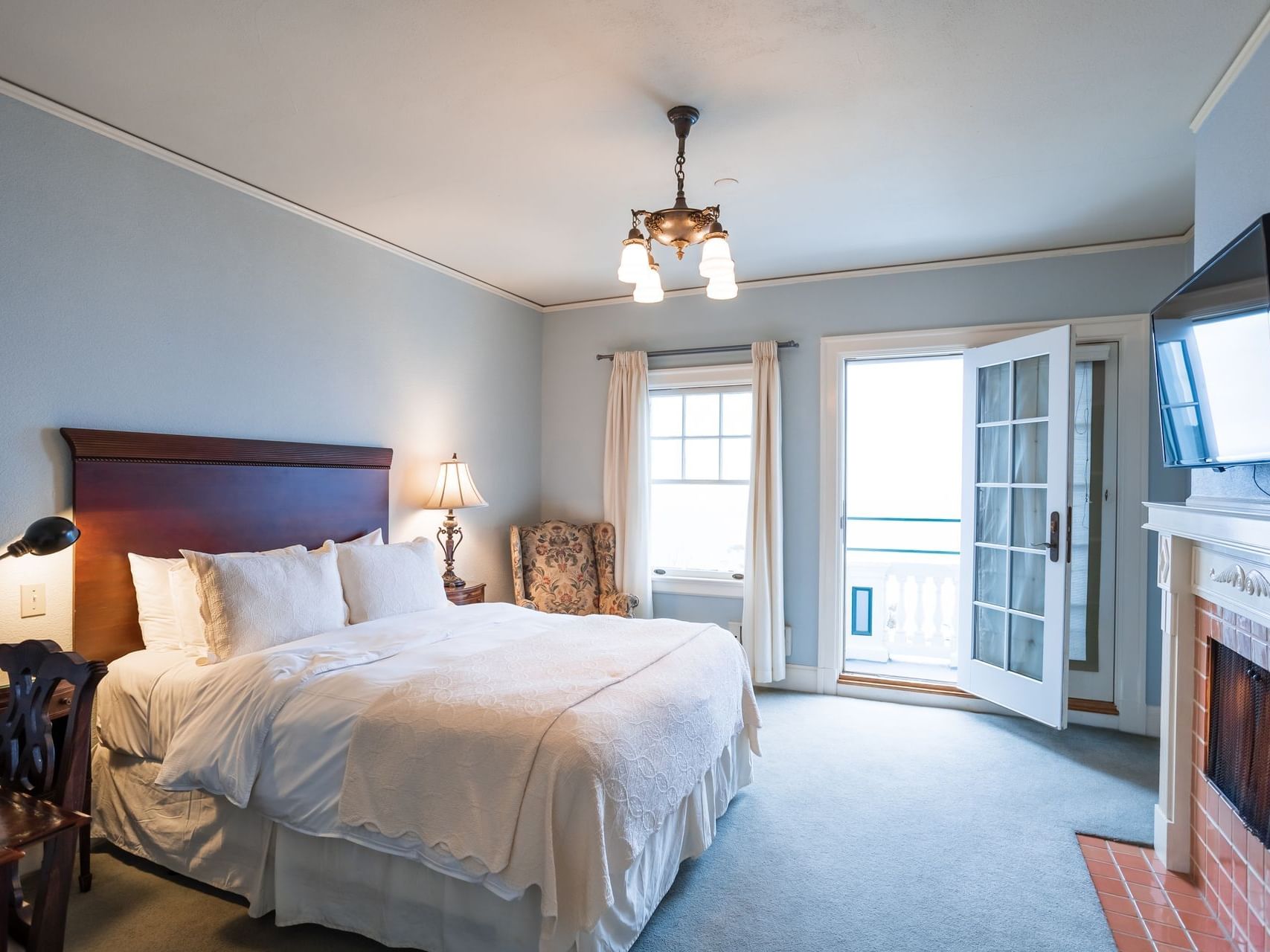 Interior of Bethany Glen Room with a fireplace at Catalina Island Company