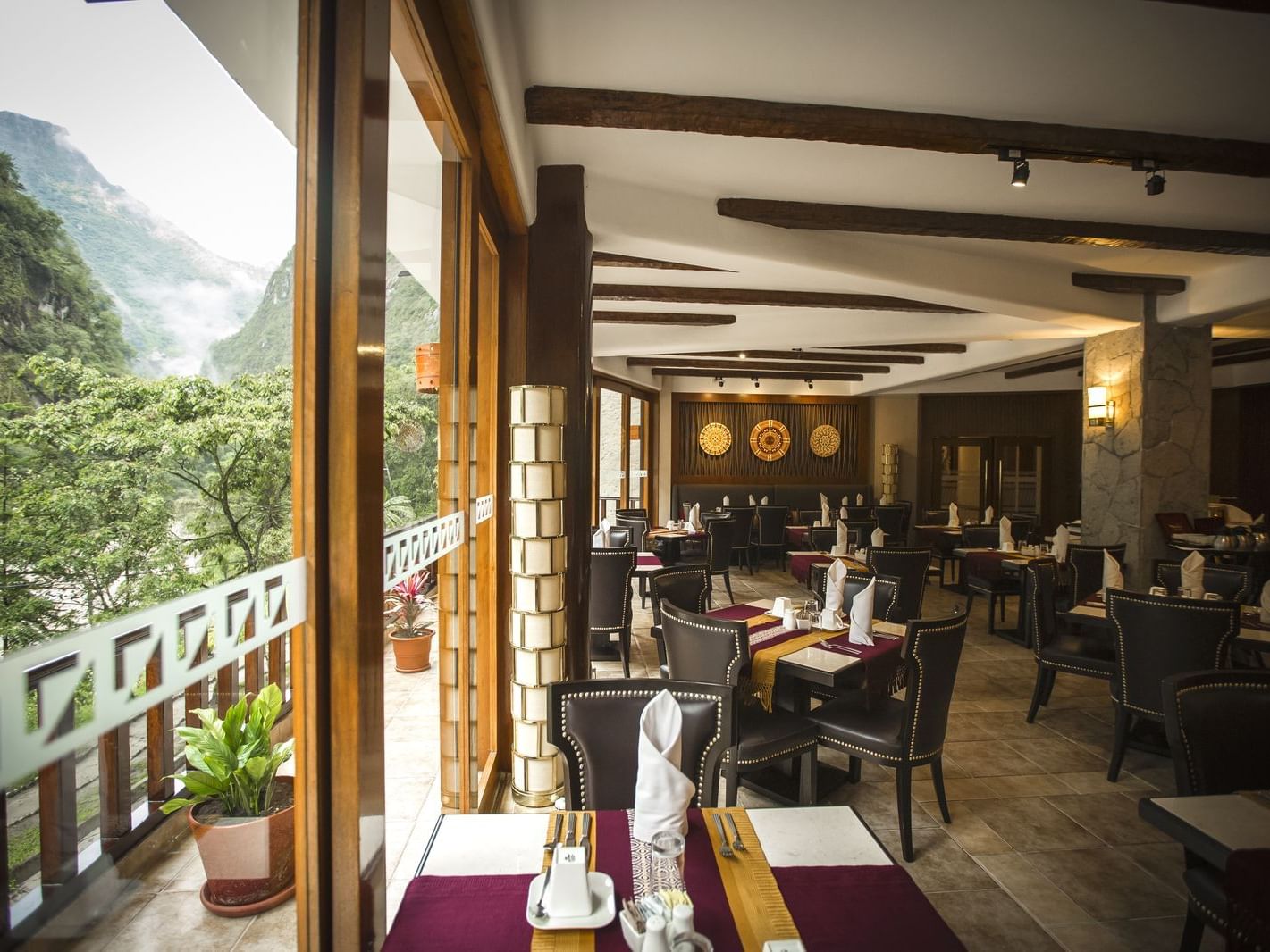 Dining area with the view in Qunuq Restaurant at Hotel Sumaq