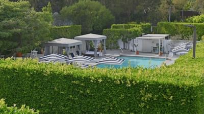 Women is pool cabana