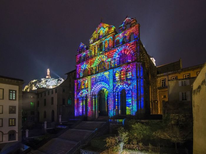 A building decroated with colorful lights in Bristol