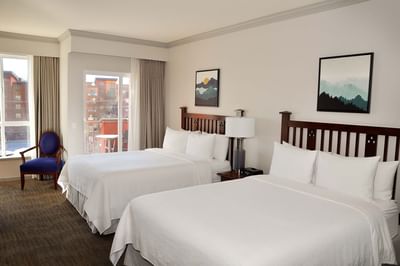 Two beds in Deluxe Guest Room at Manteo Resort Waterfront