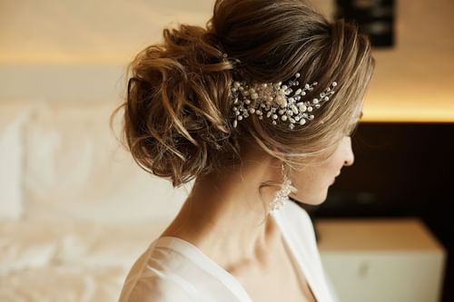 bride hairstylist at Warwick Melrose Hotel Dallas Ballroom 