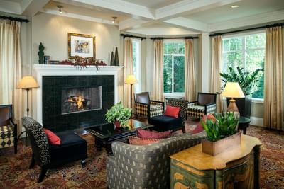 Interior of the lobby area by Plaza Inn & Suites at Ashland Creek​